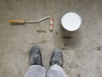 Low section of man standing on floor