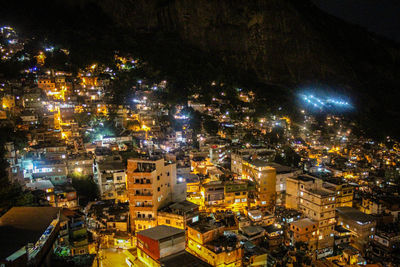 High angle view of illuminated buildings at night