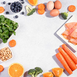 High angle view of orange fruits on table