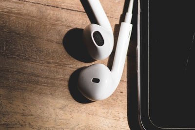 High angle view of guitar on table