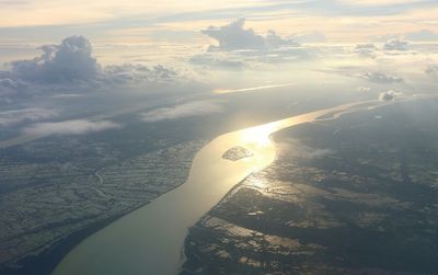 Aerial view of sea during sunset