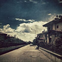 View of bridge against cloudy sky