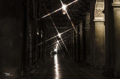 Narrow walkway at night