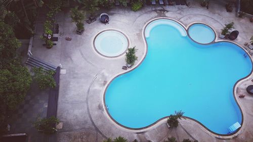 High angle view of swimming pool in city