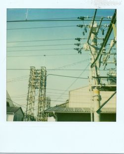 Low angle view of electricity pylon