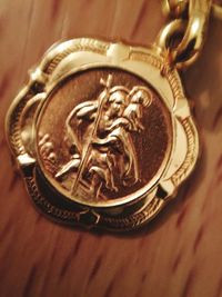 Close-up of coins on table