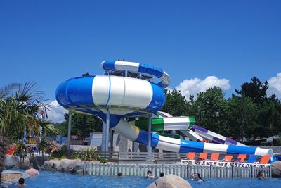 View of swimming pool against clear blue sky