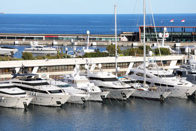 Boats moored at harbor