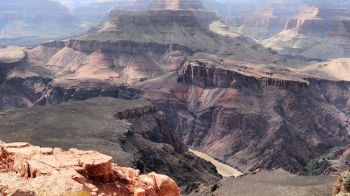 Aerial view of rock formations against sky