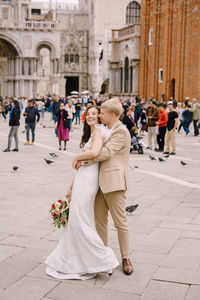 People in front of building