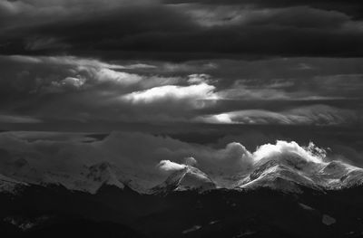 Scenic view of clouds over mountain