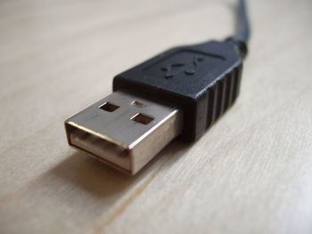 Close-up of usb cable on table