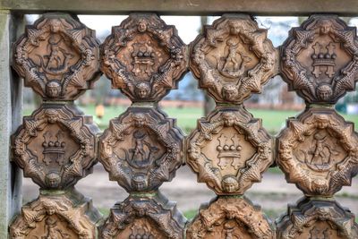 Close-up of carved railing