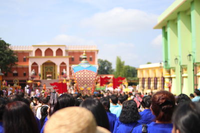 Group of people in front of historical building