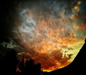 Low angle view of cloudy sky at sunset