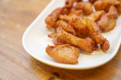 Close-up of food in plate on table