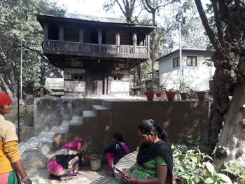 People in front of building