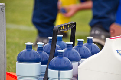 Close-up of blue bottles outdoors