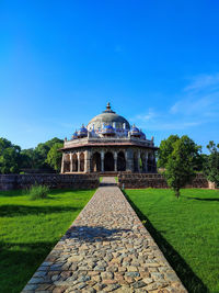 View of historic building against clear blue sky