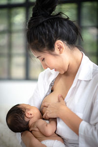 Cute baby mother and daughter
