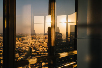 Cityscape seen through glass window