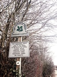 Information sign on tree trunk