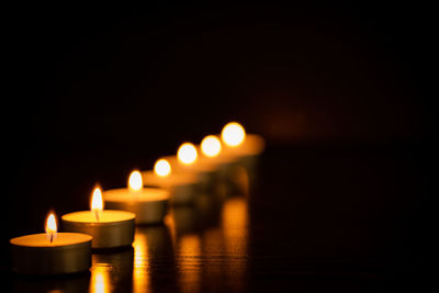 Close-up of burning candles