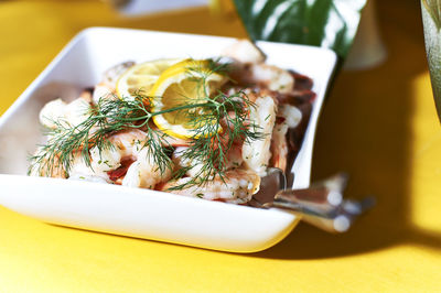 Close-up of food served on table