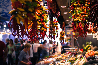 Group of people for sale at market stall