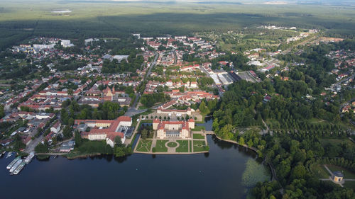 High angle view of river amidst buildings in city