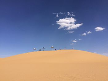 Low angle view of desert against sky