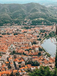 High angle view of river amidst buildings in city