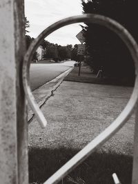 Close-up of metal structure against sky