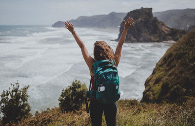 Rear view of woman looking at sea