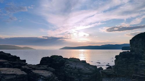 Scenic view of sea against sky during sunset