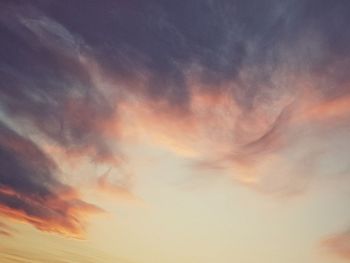 Low angle view of dramatic sky during sunset