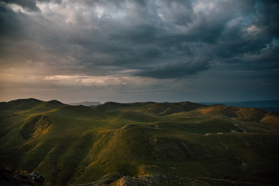 Scenic view of landscape against sky during sunset