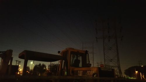 Illuminated built structure against clear sky