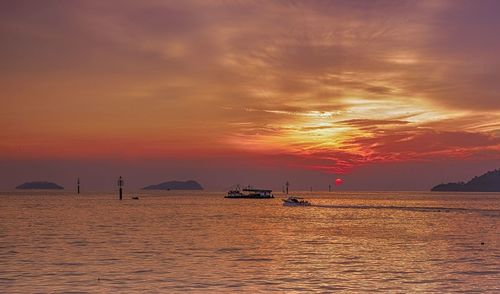 Scenic view of sea against dramatic sky