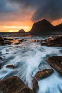 Scenic view of sea against sky during sunset