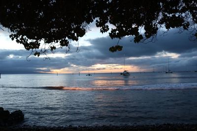 Scenic view of sea against sky at sunset