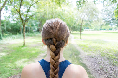 Rear view of woman with braided hair