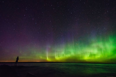 Scenic view of star field against sky at night