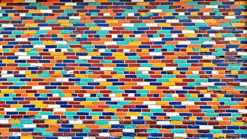 Full frame shot of multi colored brick wall