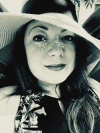 Portrait of beautiful woman in hat