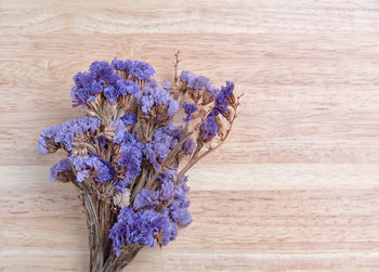 Close-up of wilted flower on table