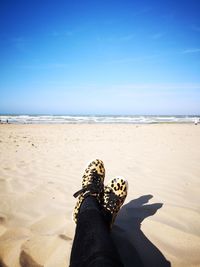 Low section of person on beach