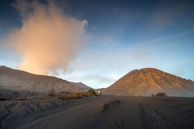 Panoramic view of snowcapped mountains against sky