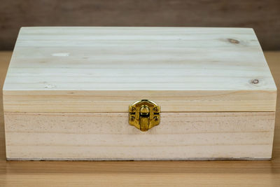 Close-up of wooden box on table