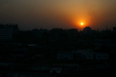View of cityscape at sunset